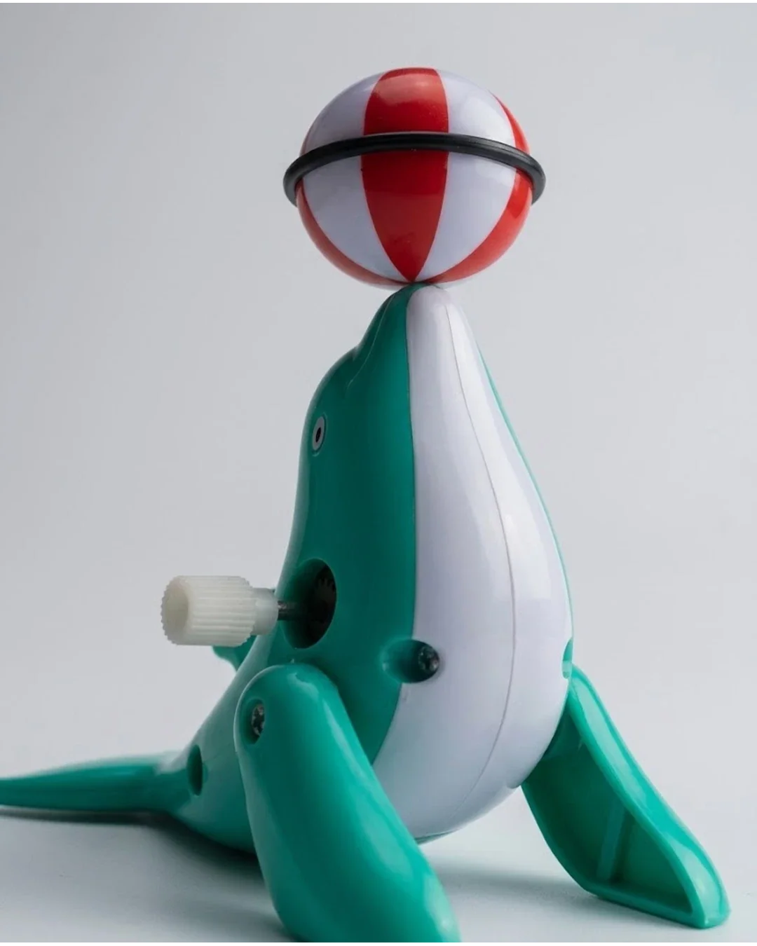 Cute Wind-Up Dolphin Toy with Spinning Ball | Classic Clockwork Toy for Kids